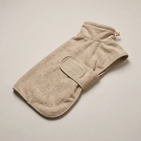The Drying Coat in Sand 